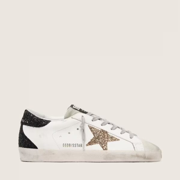 Golden Goose Super-Star in nappa leather with gold glitter star and black glitter heel tab