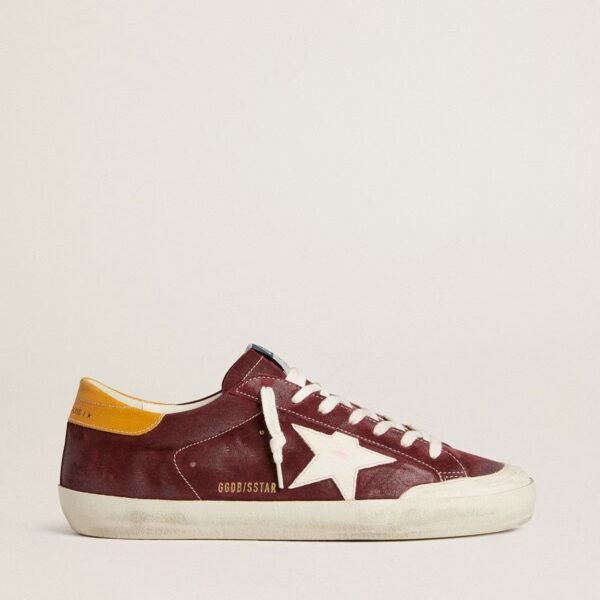 Golden Goose Super-Star in brick-red suede with white leather star and animal-print heel tab