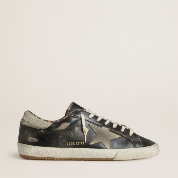 Golden Goose Super-Star in black leather with gray suede star and heel tab
