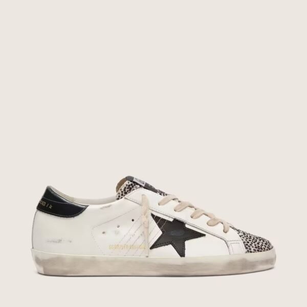 Golden Goose Super-Star LTD in white leather with black star and pony skin details