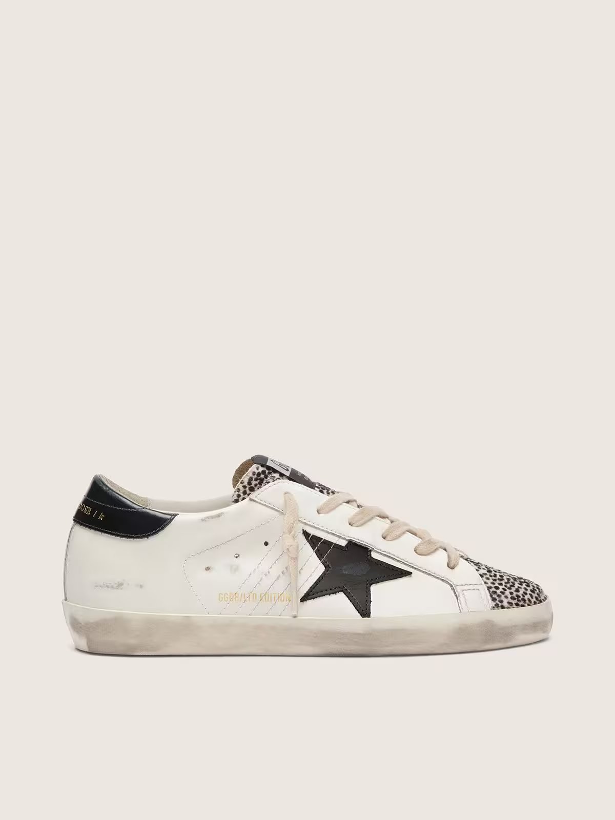 1 Golden Goose Super-Star LTD in white leather with black star and pony skin details - Image 1