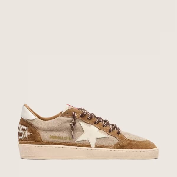 Ball Star in wool with cream leather star and brown waxed leather inserts
