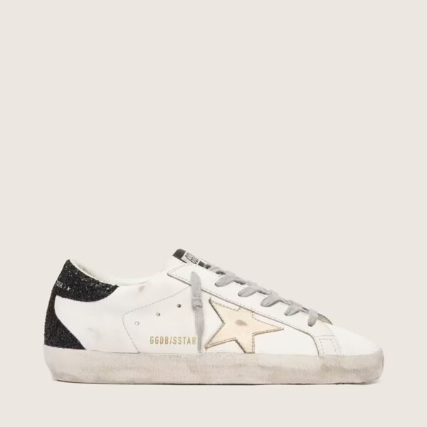 Golden Goose Super-Star with gold star and black glitter heel tab