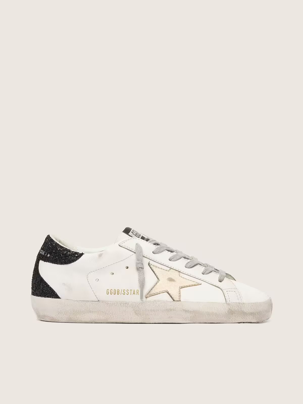 1 Golden Goose Super-Star with gold star and black glitter heel tab - Image 1