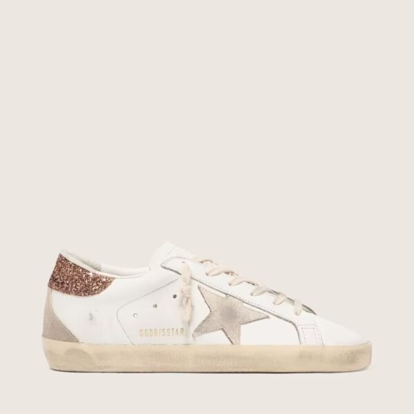 Golden Goose Super-Star with a suede star and peach-pink glitter heel tab