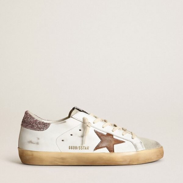 Golden Goose Super-Star with a tan star and pink glitter heel tab
