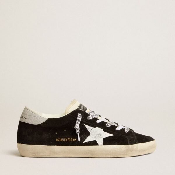 Golden Goose Super-Star LTD in black suede with white printed star and silver glitter heel tab