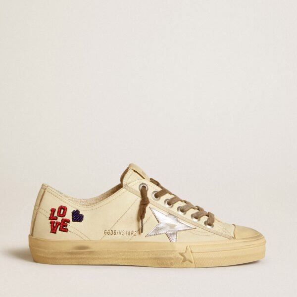 V-Star in ecru nappa with silver nappa star and beaded embroidery